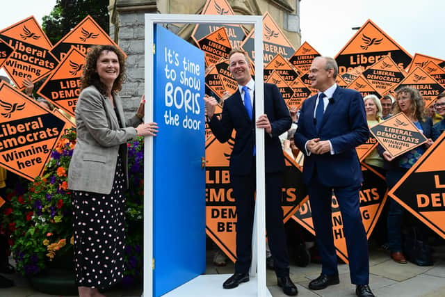 Liberal Democrats party leader Ed Davey and newly elected MP Richard Foord, centre, address supporters along with Chief Whip Wendy Chamberlain on June 24, 2022 in Tiverton (Photo by Finnbarr Webster/Getty Images)