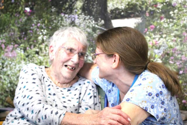A Guild Care resident enjoying one-to-one time with a carer
