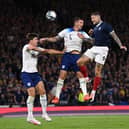 Brighton skipper Lewis Dunk played alongside Harry Maguire for England at Hampden park last night