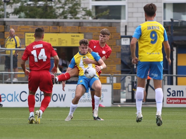 Action from Worthing's 3-0 win at Torquay United which put them top of National League South