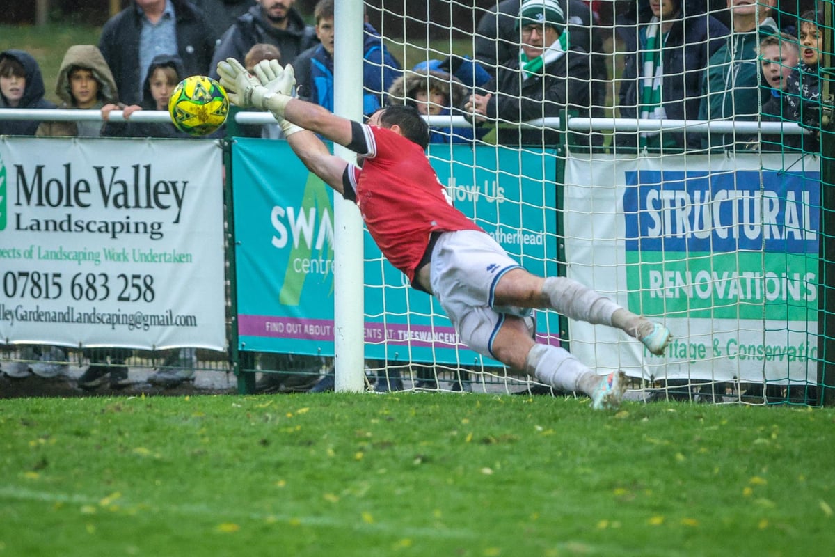 Carey keeps cool for FOUR shootout saves as Eastbourne Borough survive in soggy Surrey