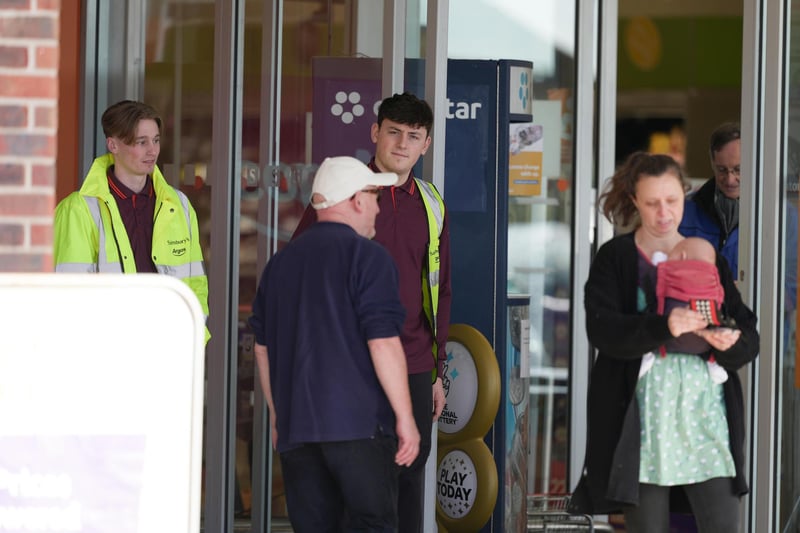 People are queueing for cash points outside Sainsbury’s stores in Sussex after a major IT fault, which has prevented card payments.