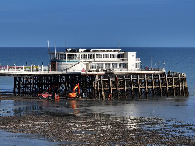 With full repair works unable to start until mid-November, the council is 'having an interim repair done' to help the remaining piles to support the weight of the pier.