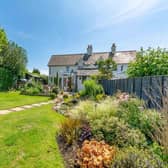This three-bedroom character property is beautifully presented and Barnham-based Pegasus Properties say the attractive landscaped garden is of particular note.