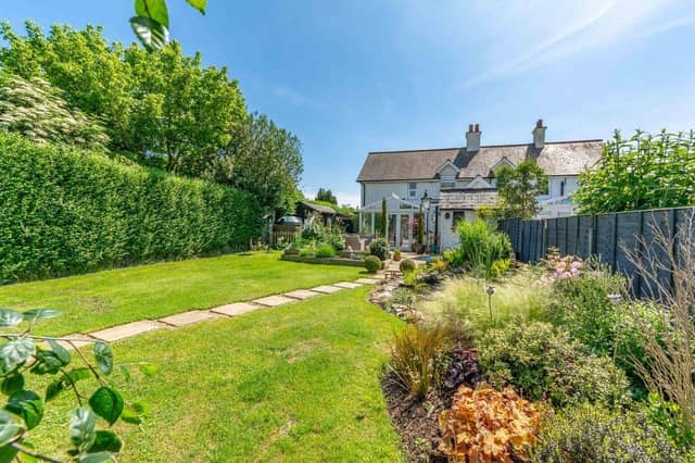 This three-bedroom character property is beautifully presented and Barnham-based Pegasus Properties say the attractive landscaped garden is of particular note.