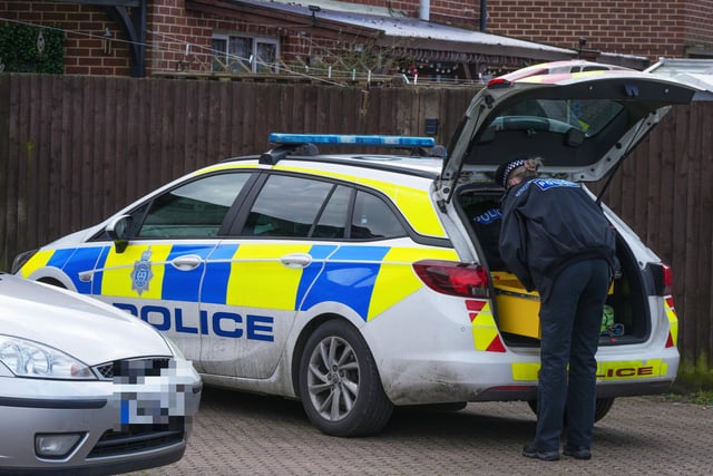 Photos show police cars, officers and a cordoned off area in Bewbush, Crawley, this afternoon (Saturday, April 15)