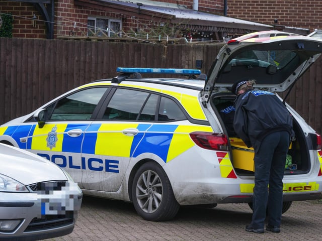 Photos show police cars, officers and a cordoned off area in Bewbush, Crawley, this afternoon (Saturday, April 15)