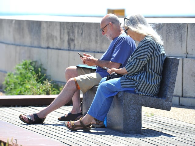 Enjoying the heatwave on Worthing beach. Pic S Robards SR2206152