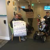 Protestors inside Barclays in Hastings. Picture by Erica Smith