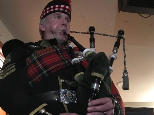 Scottish piper at the Albion