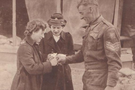 Administering first aid during bombing.