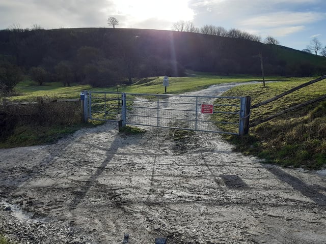 The pedestrian gate on the left will take you on to Cissbury Ring.