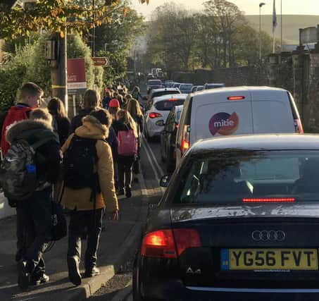 Mountfield Road during a typical morning commute with hundreds of school children jostling for space alongside a steady stream of cars.