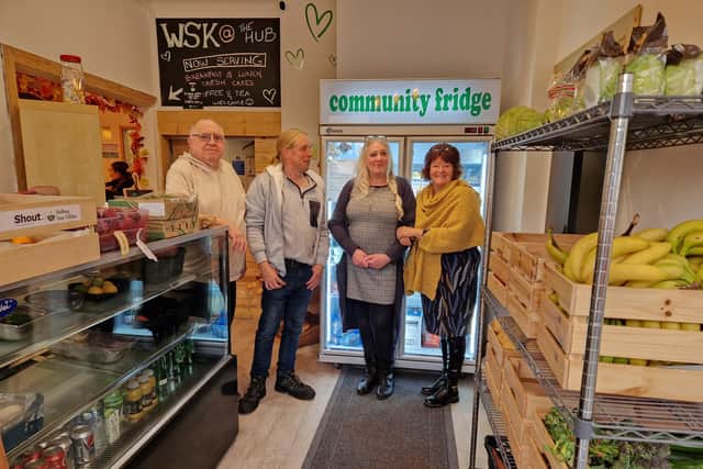 SHOUT WSK founder Khristina McCormack, third left, with volunteers at the Community Fridge