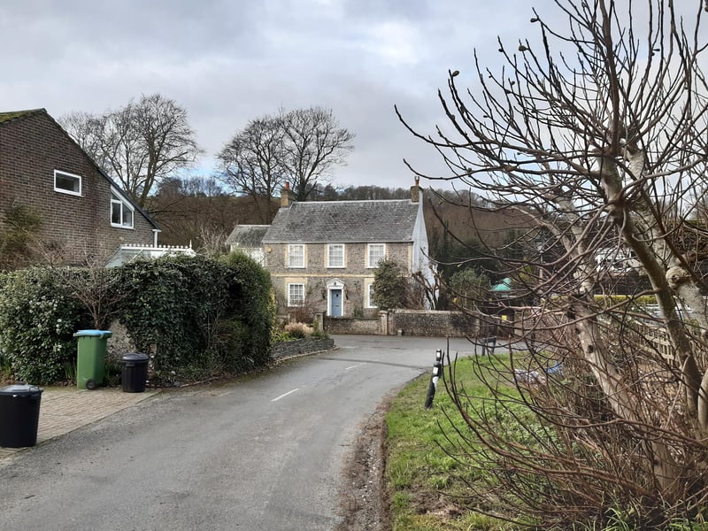 At the bottom of the road, you reach High Street in Findon village. We are turning left to visit The Black Horse but you could choose to right here to visit The Gun Inn or the Village House.