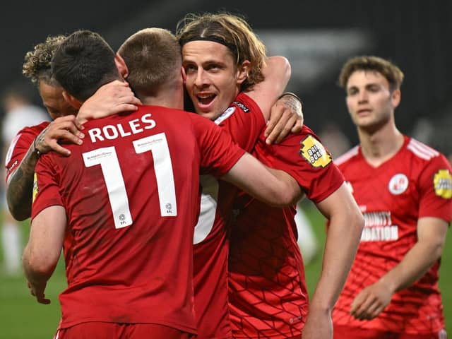 Crawley Town forward Danilo Orsi (9) scores a goal and celebrates with Crawley Town midfielder Ronan Darcy (10)  and Crawley Town midfielder Jack Roles (11) 1-5 during the EFL Sky Bet League 2 play-off second leg match between Milton Keynes Dons and Crawley Town at stadium:mk, Milton Keynes, England on 11 May 2024