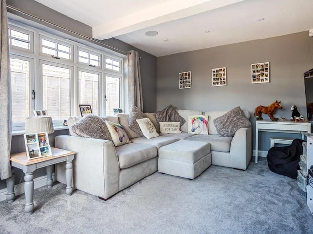 The home has a generous south and west facing sitting room