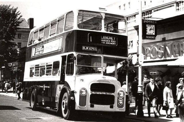 This bus is travelling down Terminus Road. The shop, Posners, was a ladies fashion retailer and behind the bus would have been Woolworths and Jones, the shoe shop.