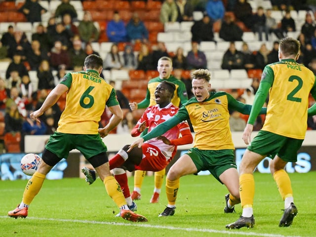 Liam Roberts of Barnsley has a shot during the Emirates FA Cup First Round match between Barnsley and Horsham at Oakwell Stadium.