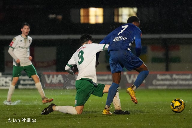 Action fron the Rocks' 2-2 draw with Wingate and Finchley at rainy Nyewood Lane