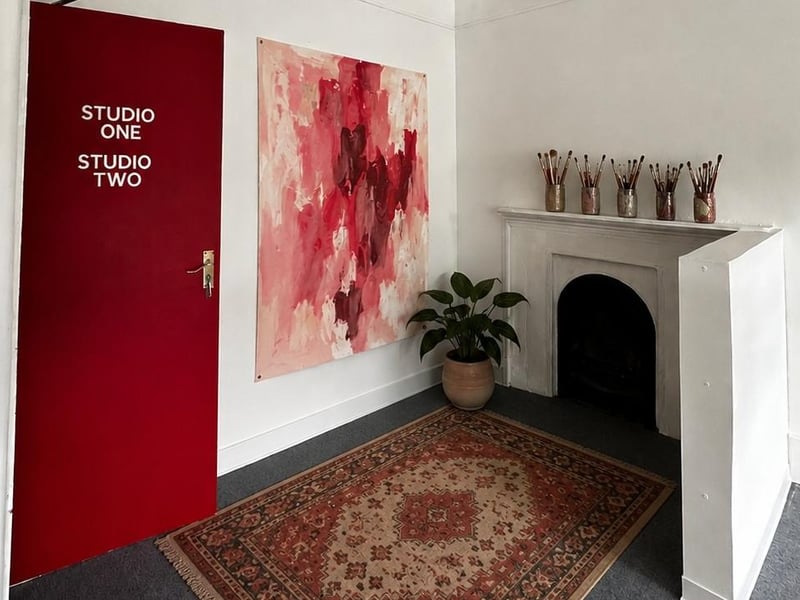 The project provides shared studio spaces where creative practitioners can develop their work within a community that understands the realities of balancing art and care