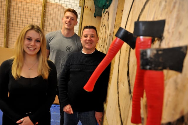 Ed Haynes (centre, owner of Dopey Dog Axe Throwing) in Burgess Hill