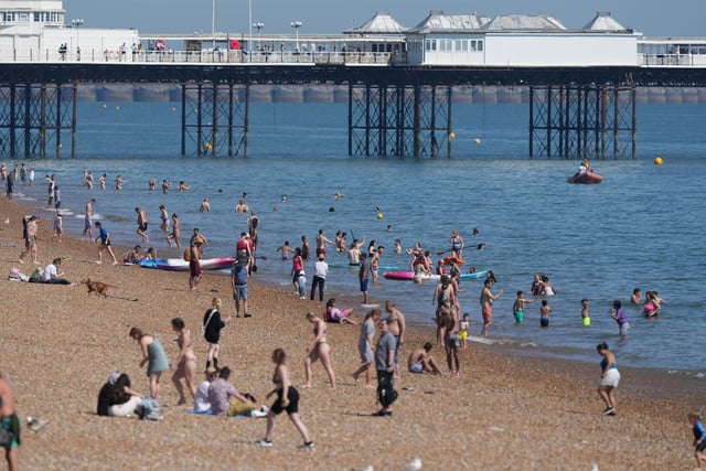 People flocked to Brighton beach to soak up the sunshine today (Wednesday, June 15)