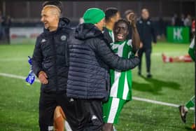 Scorer Mo Jammeh celebrates with manager Miles Rutherford and coach Darin Killpartrick | Picture: Neil Holmes