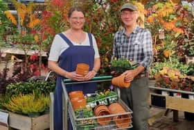 Clive Gravett at South Downs Nurseries handing over the plants and pots to Emma Evans from 