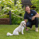 RSPCA vice president Steve Backshall plays with a wildlife-friendly frisbee with rescued puppy-farm dog Daisy at The RSPCA Garden at RHS Chelsea Flower Show, to show small acts of kindness can have a big impact on UK wildlife which is declining at a worrying rate.