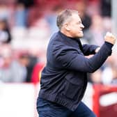 Crawley Town boss Scott Lindsey celebrates another win at the Broadfield Stadium. Picture: Eva Gilbert