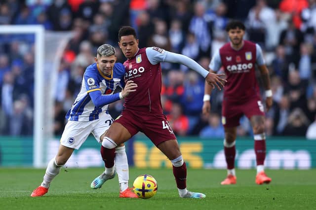 Jacob Ramsey of Aston Villa is challenged by Julio Enciso of Brighton & Hove Albion during the Premier League at the Amex in November