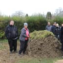 The Aldingbourne Trust group, with Horsham District Council chairman David Skipp and members of the council's parks and countryside team alongside the hibernaculum