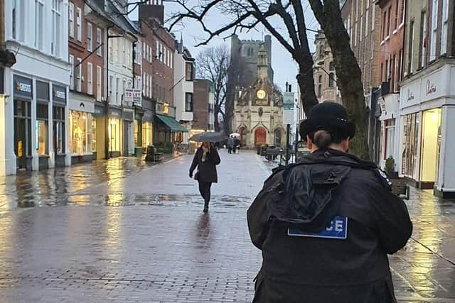 An officer patrols East Street