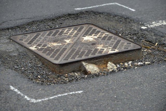 Potholes in Jevington Road, Polegate (Photo by Jon Rigby)