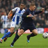 Martyn Waghorn of Derby County is held by Bernardo of Brighton & Hove Albion during the FA Cup fifth round match