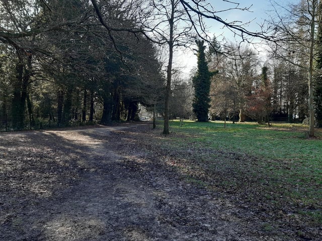 Both paths will take you towards the gate (in the centre of this photograph).