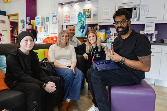 Logan presenting Romesh Ranganathan with a Teenage Cancer Trust Icon trophy: Logan, 13, Nicola: mum, Jon: Dad, Faye Hindmarsh: Teenage Cancer Trust Youth Support Worker, Romesh Ranganathan | Picture: submitted