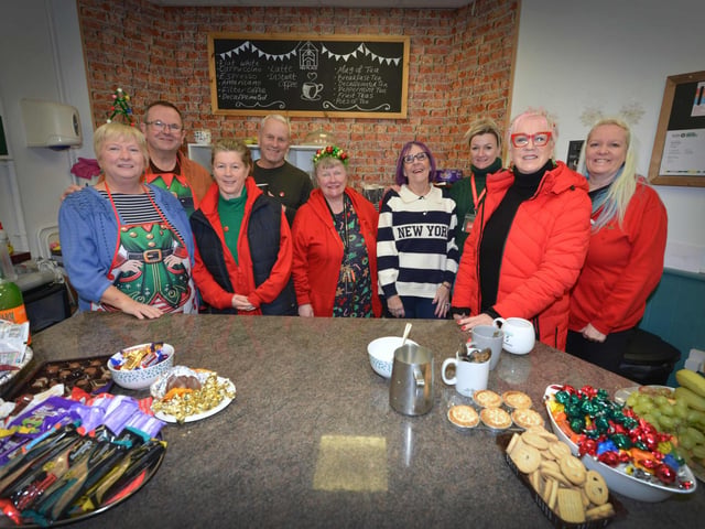 Surviving Christmas 2025 at His Place in Robertson Street on Boxing Day. Sue Peck, chair of Surviving Christmas, second from the right, with some of the volunteers.