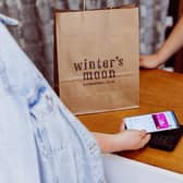 The digital gift card in use at Winter's Moon in North Street