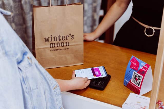 The digital gift card in use at Winter's Moon in North Street