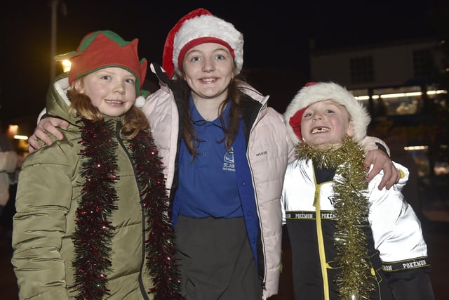 Emsworth Christmas lights were switched on in St Peter's Square on Friday, December 1, 2023. 

Pictured is: (l-r) Martha (10), Bethany (11) and Joshua (7).

Picture: Sarah Standing (011223-2921)