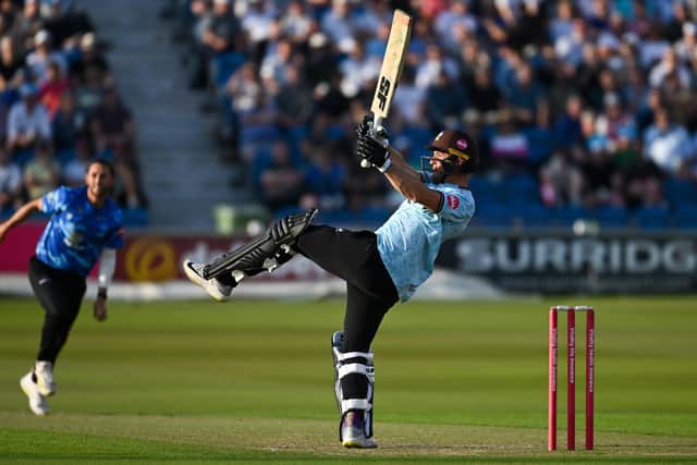 Laurie Evans of Surrey hits out during the Vitality Blast T20 match between Sussex Sharks v Surrey CCC at Hov (Photo by Mike Hewitt/Getty Images)