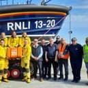 Selsey RNLI team with the case containing the scroll 6th Mar 2024
