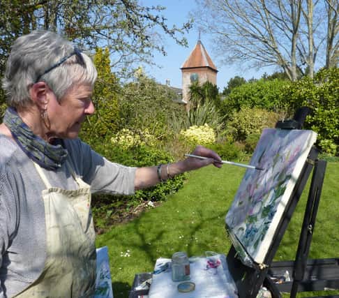 Sue painting in spring