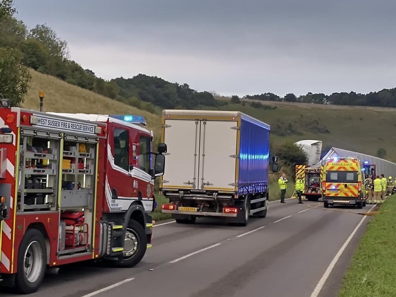 Long Furlong is closed in both directions at Findon after a road traffic collision