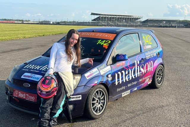 WHA press release - Jade Goodwin, British Racing Driver with her race car