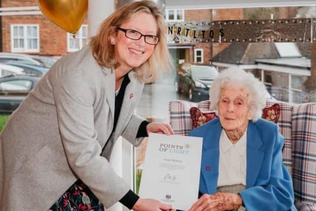 Joan receiving her Point of Light award from the Hastings MP in April