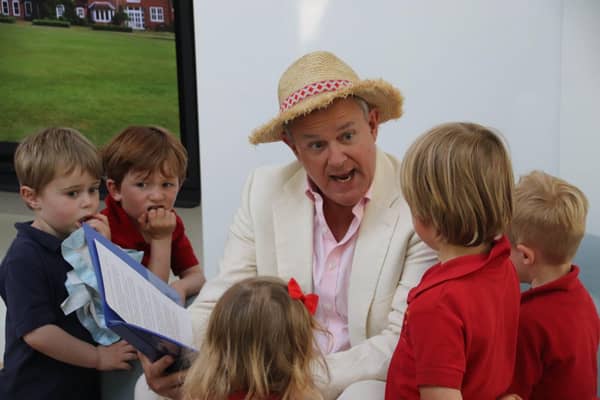 Actor Hugh Bonneville read an extract from Paddington Bear as he officially opened the nursery extension
