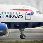 A British Airways flight returned to London Gatwick Airport after a reported fire involving a passenger’s power bank, with passengers describing a terrifying ordeal in the air. (Photo by GLYN KIRK/AFP via Getty Images)